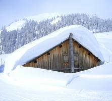 Chalet sous la neige près des Contamines